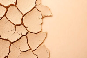 Cracked, dry surface symbolizing eczema-prone skin